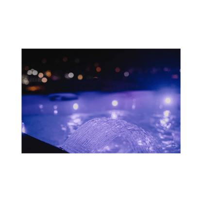 éclairage LED SpaGlo du spa Caldera Cantabria en ambiance nocturne