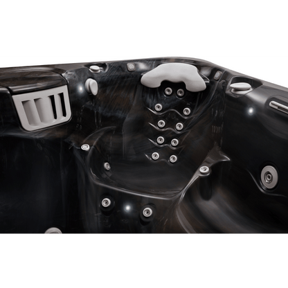 détail du siège thérapeutique du spa Caldera Niagara avec jets dorsaux et système Atlas™
