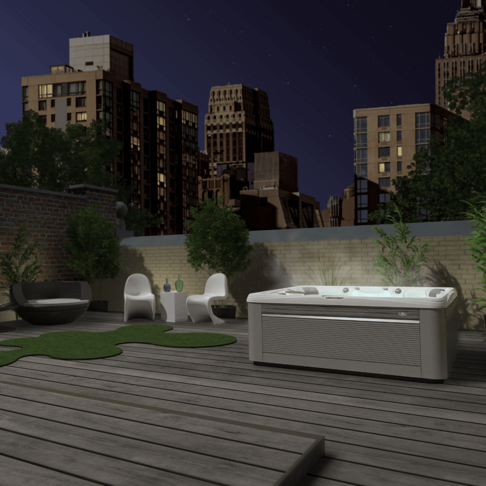 spa Caldera Salina Série Paradise installé sur terrasse urbaine de nuit avec éclairage LED et ambiance extérieure moderne