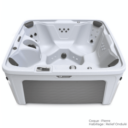 spa caldera bloom 5 places avec coque pierre et habillage relief ondule
